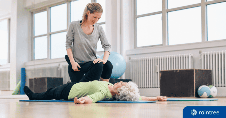 A physical therapist works with a patient. Illustrating the topic, Physical Therapy Awareness Month.