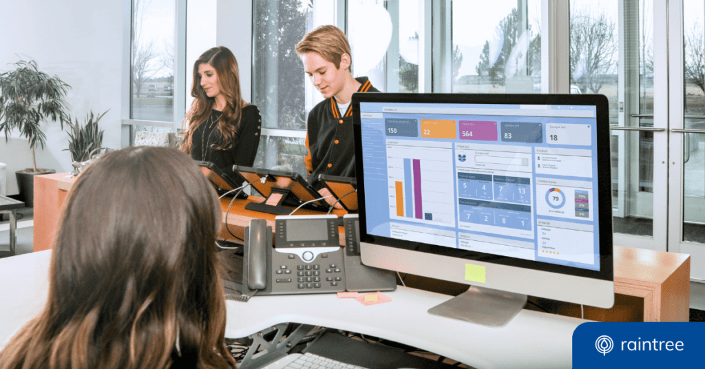 Two Patients Check In For Their Health Appointments Using Kiosks At The Front Desk, While The Front Desk Admin Looks At A Patient Engagement Dashboard On Their Monitor. Illustrating The Topic: &Quot;Patient Engagement In The Digital Age.&Quot;