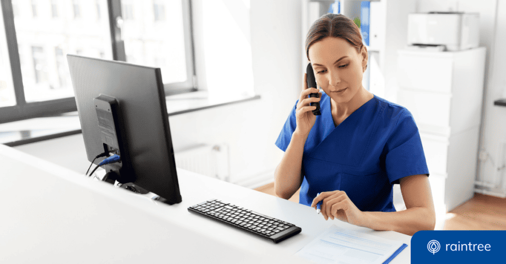 Someone at the front desk of a physical therapy practice talks on the phone with a patient. Illustrating the topic: "How to Attract New PT Patients to Your Practice."