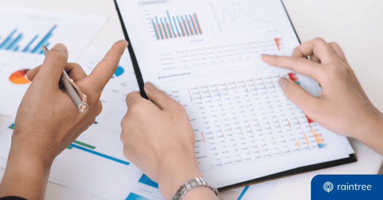 A close up of two people holding a clipboard with a data report printed out. Illustrating the topic: "How to Use Business Intelligence Tools for Practice Management."
