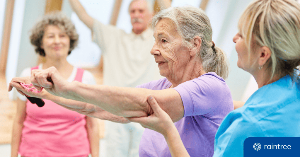 A physical therapist assists a senior patient in a group setting, with two other patients in the background. Illustrating the topic: "Medicare Billing for Group Therapy vs Individual Therapy"
