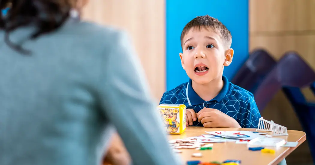 A Header Image Depicting A Child With Their Mouth Open To Form A Word During Speech Therapy. The Headline Reads: &Quot;Methods Of Speech Therapy.&Quot;
