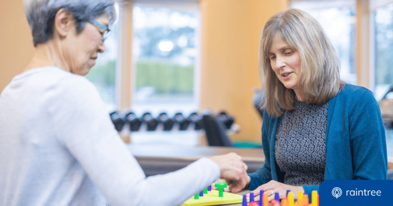 An occupational therapist works with a patient. Illustrating the topic: "Rehabilitative vs Habilitative Therapy"