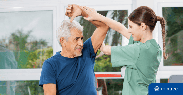 A physical therapist works with a patient in a modern PT clinic. Illustrating the "Therapy and Rehab Provider Journey" with Raintree Systems' software.