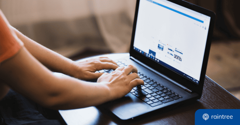 A person with an orange shirt types on a black laptop, searching for a physical therapy practice on Google. Illustrating the topic: "SEO for Physical Therapy Practices."