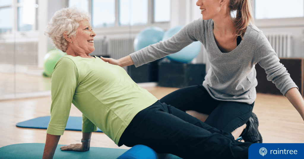 A Physical Therapist Helps A Medicare Patient, Who Leans Back While Looking Up And Smiling. Illustrating The Topic: &Quot;A New Mips Value Pathway For Rehabilitation Therapy.&Quot;