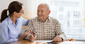 A speech therapist with a Medicare patient, illustrating the topic of speech therapy billing and Medicare payments.