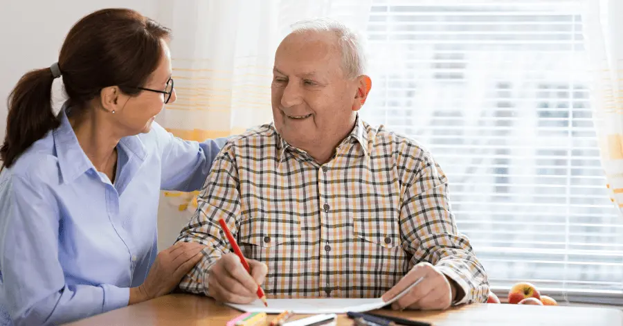 A Speech Therapist With A Medicare Patient, Illustrating The Topic Of Speech Therapy Billing And Medicare Payments.