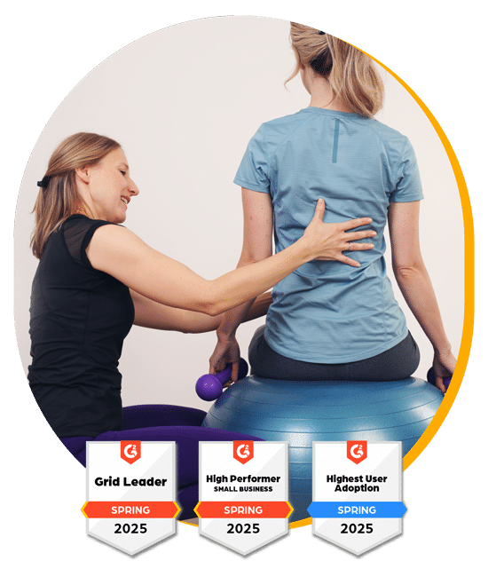 A Rehabilitation Therapist Wearing A Black Athletic Shirt Talks With A Patient Who Is Seated On A Blue Balance Ball. Below The Image Are Badges Representing The Latest G2 Awards For The Raintree Emr Software For Pt And Rehab.