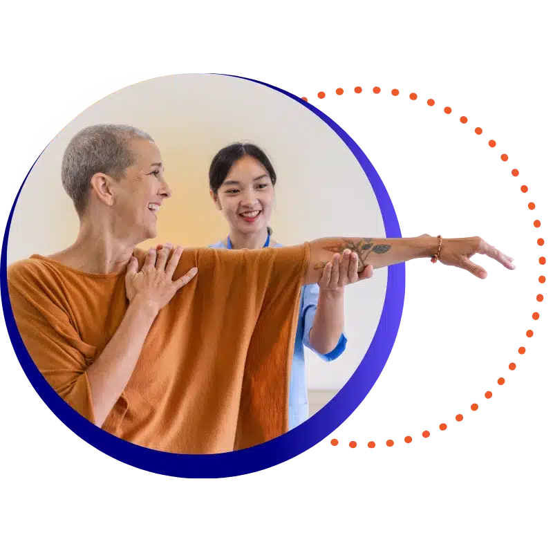Patient Portal Hero: A Physical Therapy Patient And A Pt Smiling As The Patient Raises One Arm And Looks Across The Room.