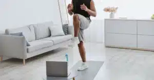 A physical therapy patient completes home exercises after an injury, illustrating the topic: return to work program success.