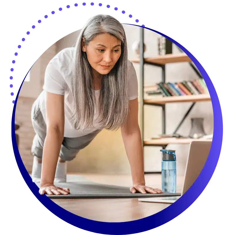 Telehealth 1 Telehealth Hero: A Physical Therapy Patient Smiles As She Completes Home Exercise Programs While Looking At A Laptop.