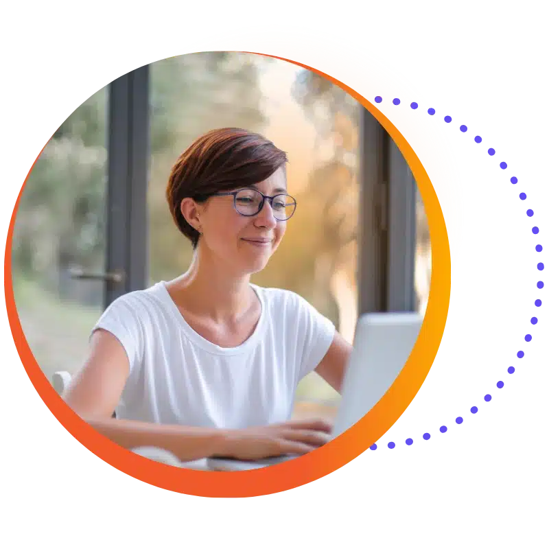 Raintree Webinars Hero: A Physical Therapy Expert Speaker Wearing Glasses And A White Shirt Smiles At Her Laptop During A Webinar.