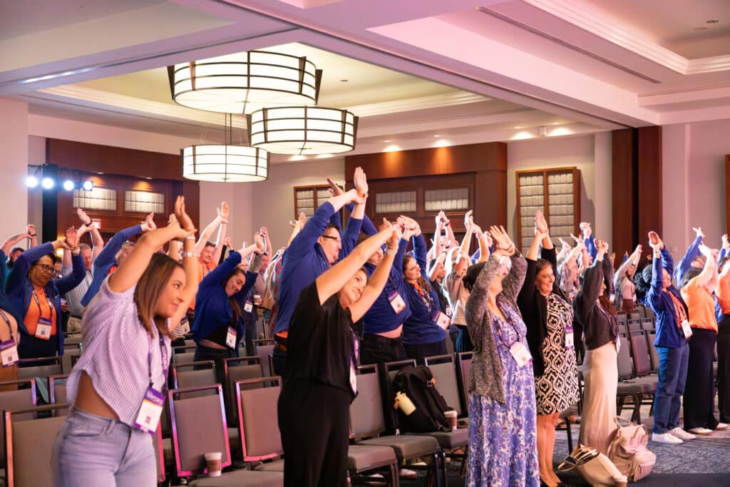 Raintree Therapycon Attendees Stretching During The Conference. 